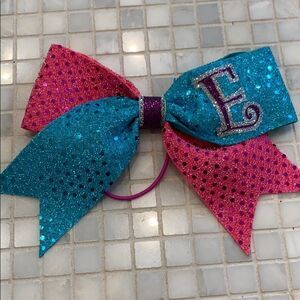 Girls teal and pink letter E hair bow